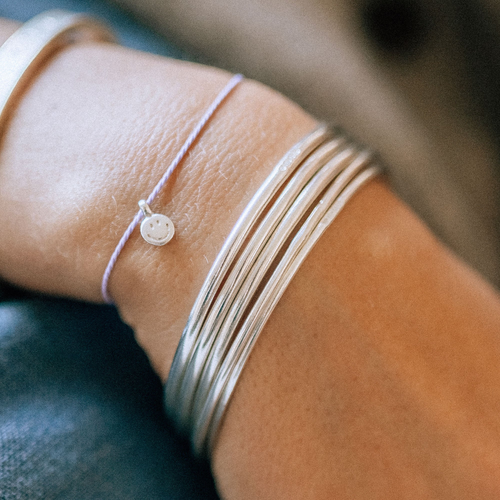 Silver Smiley Face Cord Bracelet