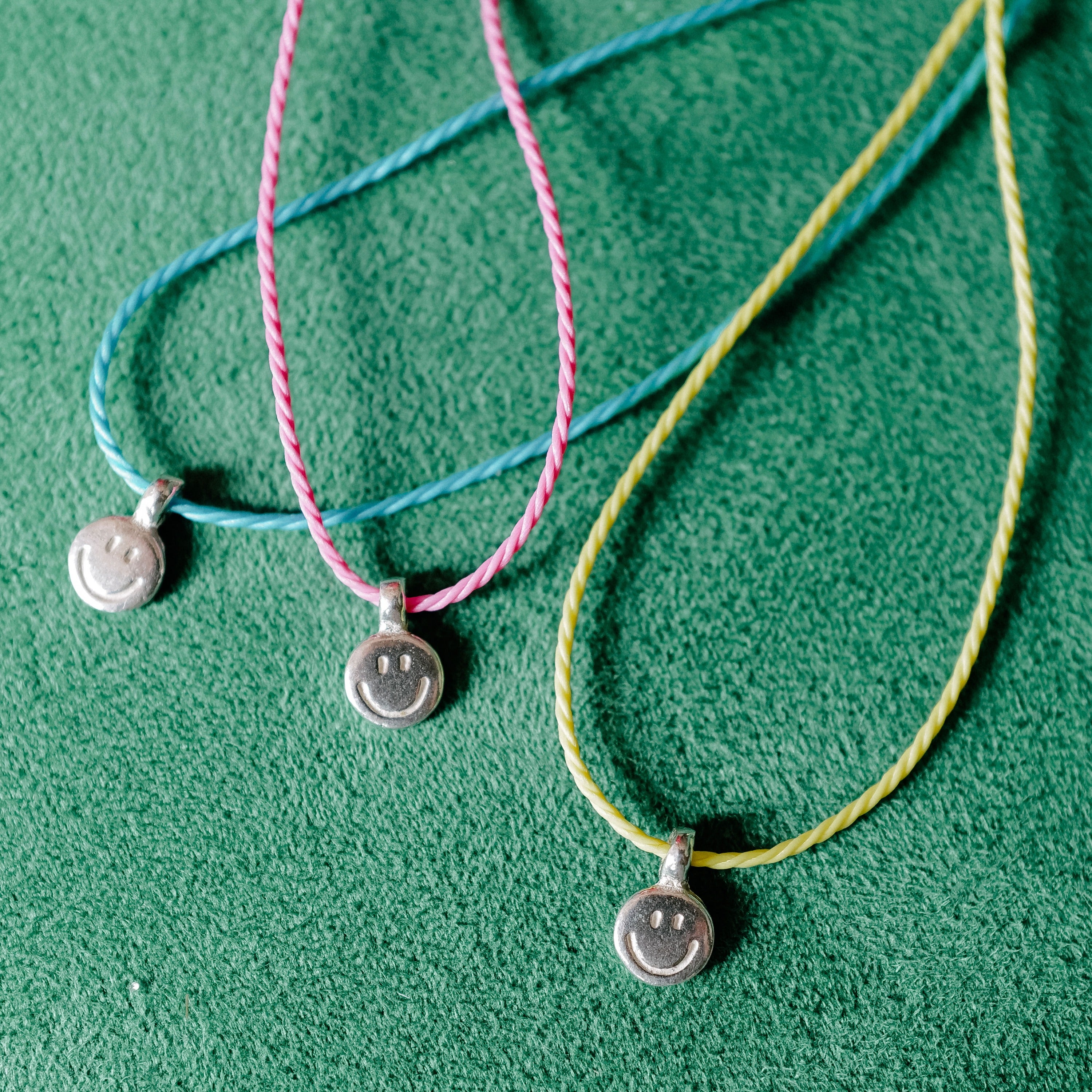 Silver Smiley Face Cord Bracelet