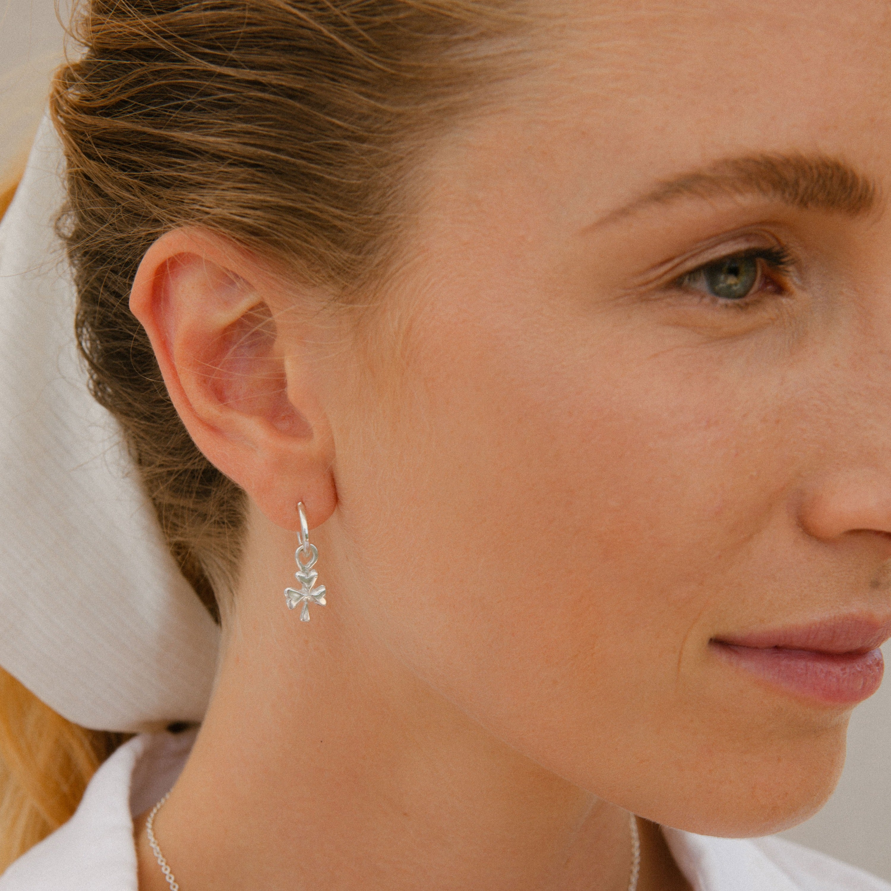 Tiny Cupid Hoops With Baby Shamrock Charms